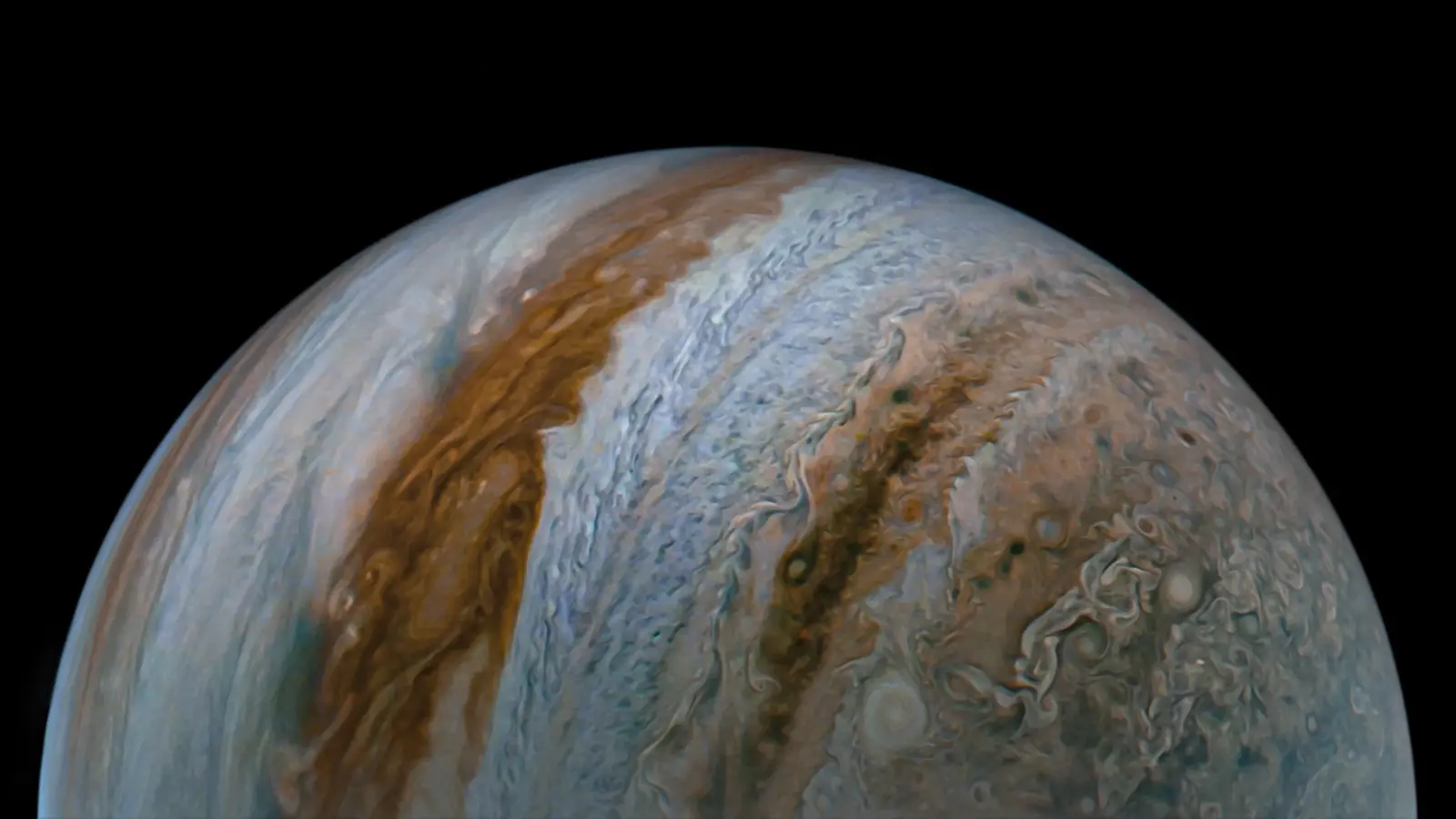 Jupiterio lankas: bangos ir šokeliai stabdo saulės vėją