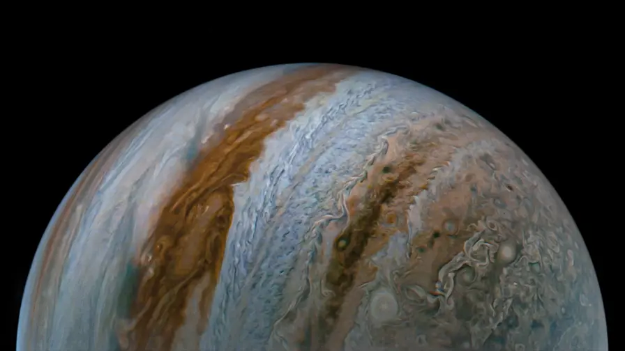 Jupiterio lankas: bangos ir šokeliai stabdo saulės vėją Jupiterio lankas: bangos ir šokeliai stabdo saulės vėją